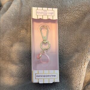 tarte maracuja juicy loop pink donut charm lip gloss holder
